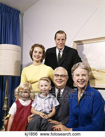 1960S Portrait Of Three Generation Family Parents Grandparents Son Daughter Man Woman Boy Girl View Large Photo Image Stock Photograph - 1960S Portrait Of Three Generation Family Parents Grandparents Son Daughter Man Woman Boy Girl. Fotosearch