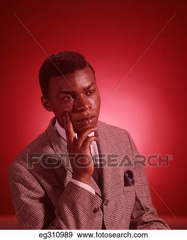1960S Portrait Thoughtful African-American Young Man Hand To Chin View Large Photo Image Stock Photo - 1960S Portrait Thoughtful African-American Young Man Hand To Chin. Fotosearch