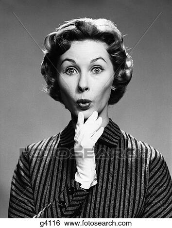 1960S Portrait Woman White Gloves Hand To Chin Shocked Surprised Astonished Facial Expression View Large Photo Image Stock Photograph - 1960S Portrait Woman White Gloves Hand To Chin Shocked Surprised Astonished Facial Expression . Fotosearch