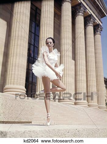 Picture - 1960S Retro Woman Ballerina Dancing In White Tutu And Ballet Toe Shoes On The Steps Of Philadelphia Art Museum. Fotosearch