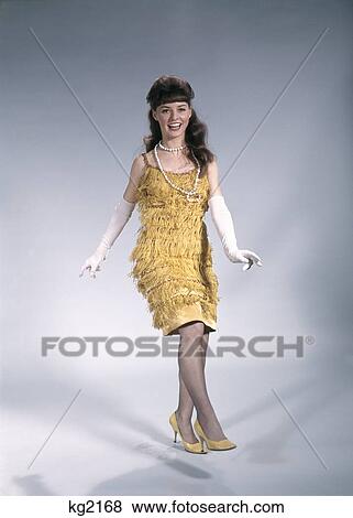 1960S Retro Woman Dressed Fringed Flapper Costume View Large Photo Image Stock Photo - 1960S Retro Woman Dressed Fringed Flapper Costume. Fotosearch