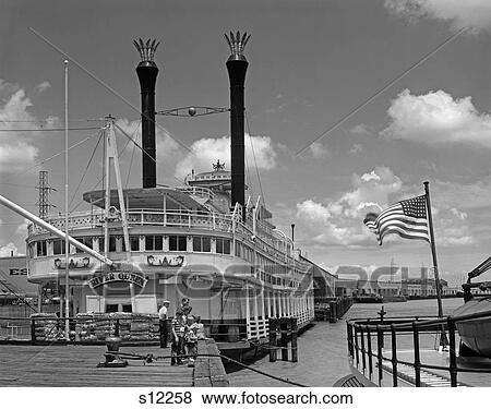 1960S River Queen Boat At Esplanade Street Wharf In New Orleans Family Standing At Dock View Large Photo Image Stock Photo - 1960S River Queen Boat At Esplanade Street Wharf In New Orleans Family Standing At Dock . Fotosearch