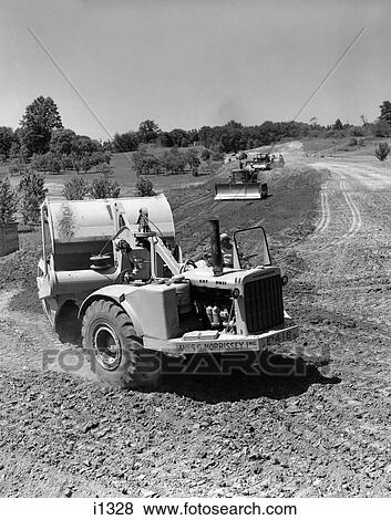 1960S Series Of 3 Tractors Plowing & Leveling Cleared Land To Make Roadway View Large Photo Image Stock Photo - 1960S Series Of 3 Tractors Plowing & Leveling Cleared Land To Make Roadway . Fotosearch