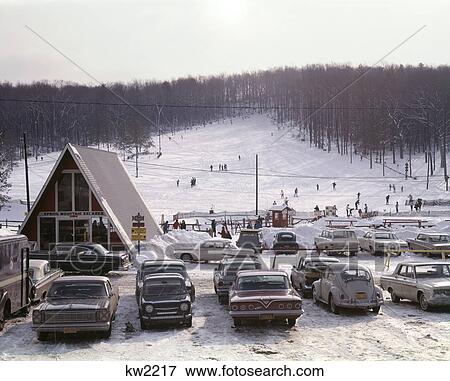 1960S Ski Slope In Pocono Area Of Pa A-Frame Building And Parked Cars In Snow Skiiers On Hill Side View Large Photo Image Stock Photo - 1960S Ski Slope In Pocono Area Of Pa A-Frame Building And Parked Cars In Snow Skiiers On Hill Side. Fotosearch