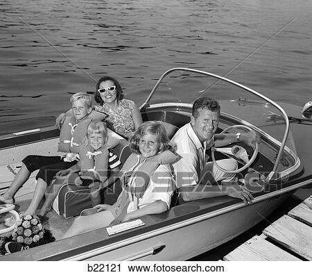 1960S Smiling Family Of Five In Docked Boat Children Wearing Life Vests View Large Photo Image Stock Image - 1960S Smiling Family Of Five In Docked Boat Children Wearing Life Vests . Fotosearch