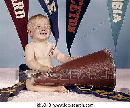 1960S Smiling Happy Baby Girl With Megaphone Surrounded By Pennants View Large Photo Image Stock Image - 1960S Smiling Happy Baby Girl With Megaphone Surrounded By Pennants. Fotosearch