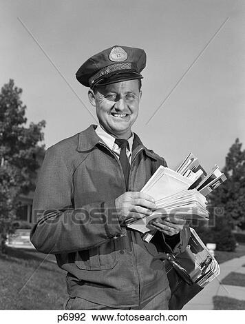 Stock Image - 1960S Smiling Mailman Holding Letters Mailbag Outdoors . Fotosearch