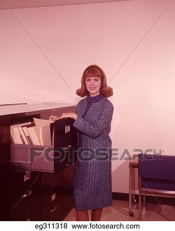 1960S Smiling Woman File Cabinet View Large Photo Image Stock Photo - 1960S Smiling Woman File Cabinet. Fotosearch