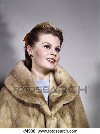1960S Smiling Woman Wearing Fur Mink Coat Fashion Beauty Portrait View Large Photo Image Stock Photo - 1960S Smiling Woman Wearing Fur Mink Coat Fashion Beauty Portrait . Fotosearch