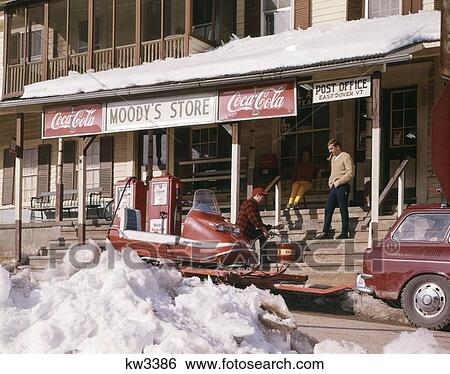 1960S Snowmobile Trailer Car Parked By Moodys Store Post Office East Dover Vt 2 Men On Steps Coke Coca Cola Signs Snow View Large Photo Image Stock Photograph - 1960S Snowmobile Trailer Car Parked By Moodys Store Post Office East Dover Vt 2 Men On Steps Coke Coca Cola Signs Snow. Fotosearch
