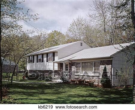 1960S Spring Scene Split Level Ranch Suburban House Home View Large Photo Image Stock Photo - 1960S Spring Scene Split Level Ranch Suburban House Home. Fotosearch