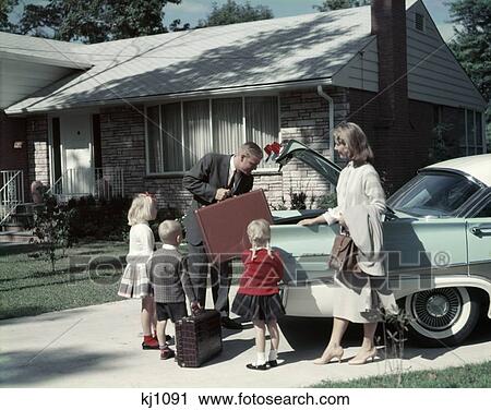 1960S Suburban Family Loading Ford Four Door Sedan Automoble For Trip Nostalgia Outdoor Man Woman Boy Girl View Large Photo Image Stock Image - 1960S Suburban Family Loading Ford Four Door Sedan Automoble For Trip Nostalgia Outdoor Man Woman Boy Girl. Fotosearch