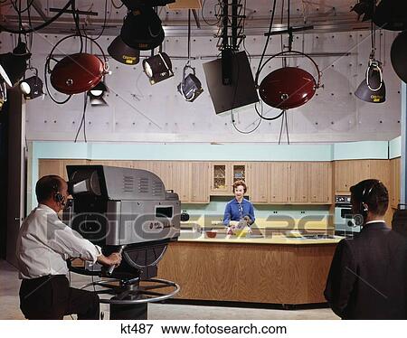 1960S Television Station Filming Cooking Show With Chef, Director And Cameraman Man Woman Nostalgia Wfil View Large Photo Image Stock Photo - 1960S Television Station Filming Cooking Show With Chef, Director And Cameraman Man Woman Nostalgia Wfil. Fotosearch