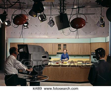 1960S Telvision Studio Two Cameramen Filming Woman Doing Cooking Show View Large Photo Image Stock Photo - 1960S Telvision Studio Two Cameramen Filming Woman Doing Cooking Show . Fotosearch
