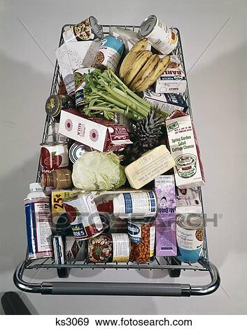 Stock Photo - 1960S Top View Of Full Super Market Food Grocery Shopping Cart Packed. Fotosearch