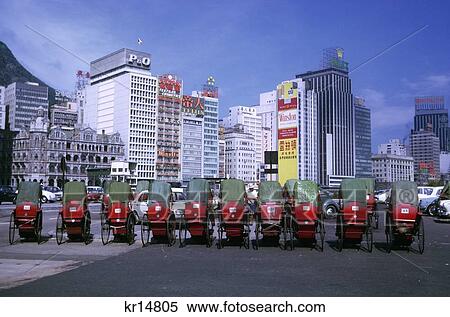 1960S Transportation Rickshaw Line Up Hong Kong Old And New Building Skyline Two Wheel Manpower Vehicle View Large Photo Image Stock Photography - 1960S Transportation Rickshaw Line Up Hong Kong Old And New Building Skyline Two Wheel Manpower Vehicle. Fotosearch