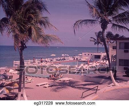 1960S Tropical Beach And Swimming Pool At Hotel View Large Photo Image Stock Photo - 1960S Tropical Beach And Swimming Pool At Hotel. Fotosearch