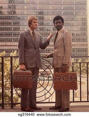 1960S Two Salesmen One African-American Carrying Attaché Cases View Large Photo Image Stock Image - 1960S Two Salesmen One African-American Carrying Attaché Cases. Fotosearch