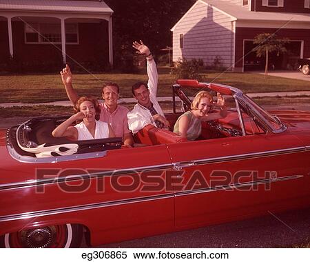 1960S Two Young Teen Couples In Red Convertible Car On Suburban Street Waving Hands Laughing View Large Photo Image Stock Photography - 1960S Two Young Teen Couples In Red Convertible Car On Suburban Street Waving Hands Laughing. Fotosearch