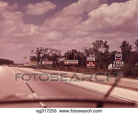 Stock Photography - 1960S View Thru Windshield Of Road Ahead. Fotosearch
