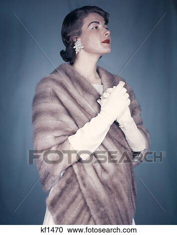 Stock Image - 1960S Woman In Fur Stole Wrap Elegant Fashion Luxury Item . Fotosearch