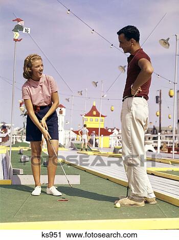 1960S Young Couple Playing Miniature Golf View Large Photo Image Stock Image - 1960S Young Couple Playing Miniature Golf . Fotosearch