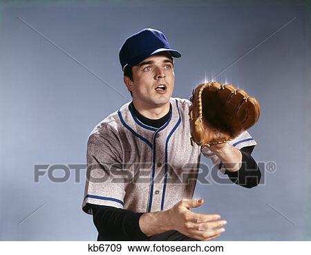 1960S Young Man In Baseball Uniform Holding Out Glove To Catch Ball Mitt Ready Alert View Large Photo Image Stock Photo - 1960S Young Man In Baseball Uniform Holding Out Glove To Catch Ball Mitt Ready Alert. Fotosearch