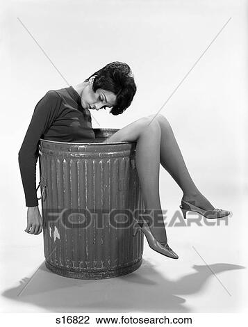 1960S Young Woman In Trash Can View Large Photo Image Stock Image - 1960S Young Woman In Trash Can. Fotosearch