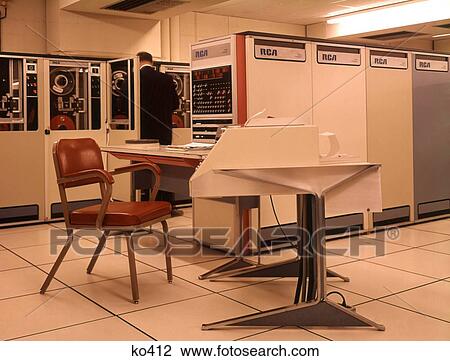 Stock Image - 1970 1970S 1960 1960S Computer Room Man Rca 7045 Processor Main Frame . Fotosearch