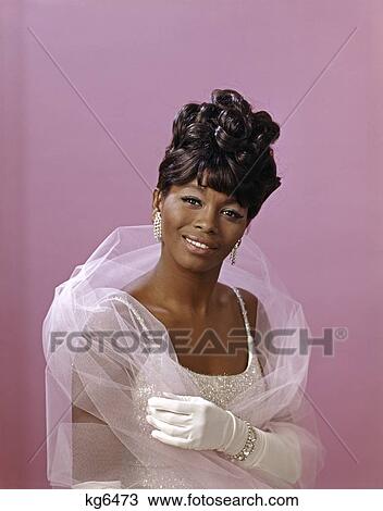 1970S 1960S Portrait African-American Woman Smiling Formal Attire Gown Gloves Net Stole View Large Photo Image Stock Image - 1970S 1960S Portrait African-American Woman Smiling Formal Attire Gown Gloves Net Stole . Fotosearch