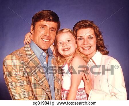 1970S Head Shoulders Portrait Smiling Family Of 3 View Large Photo Image Stock Image - 1970S Head Shoulders Portrait Smiling Family Of 3 . Fotosearch