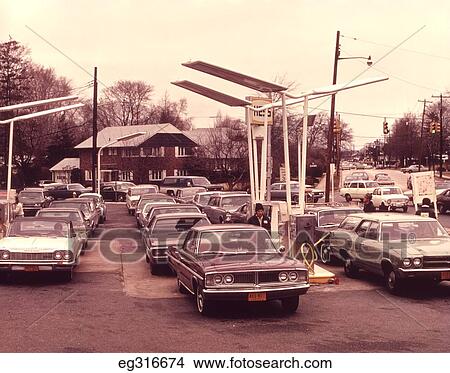 1970S Long Lines At Gas Pumps During Oil Crisis View Large Photo Image Picture - 1970S Long Lines At Gas Pumps During Oil Crisis. Fotosearch
