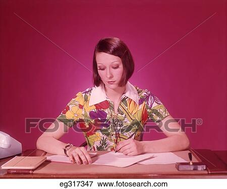 1970S Woman At Desk Wearing Colorful Blouse View Large Photo Image Stock Photo - 1970S Woman At Desk Wearing Colorful Blouse. Fotosearch