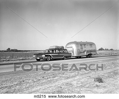 Stock Photography - Car And Trailer Camper Camping 1960 1960S Retro Traveling Travel Driving Trip Vacation Retro. Fotosearch