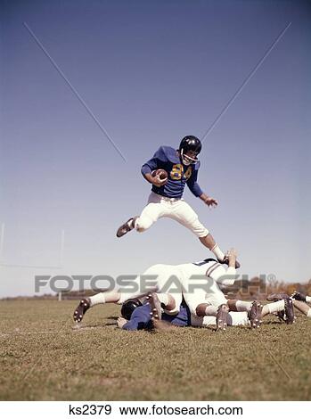 Stock Photo - Football Team Receiver Players 1960 1960S Retro. Fotosearch