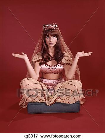 Retro Woman Dressed Genie'S Costume View Large Photo Image Stock Photo - Retro Woman Dressed Genie'S Costume. Fotosearch