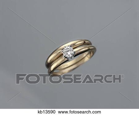 Stock Image - Wedding Ring Diamond Gold Retro 1960 1970 1960S 1970S. Fotosearch