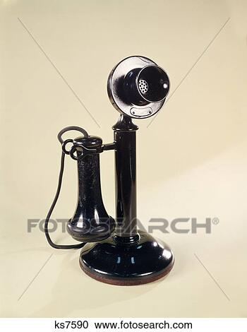 1900s 1910s ic1920s black candlestick style telephone View Large Photo Image Stock Image - 1900s 1910s ic1920s black candlestick style telephone. Fotosearch