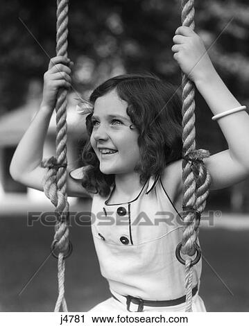 1930s child smiling sitting on swing View Large Photo Image Stock Image - 1930s child smiling sitting on swing. Fotosearch