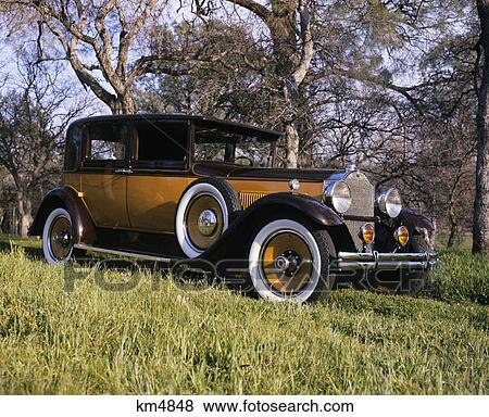 1930s gold and black packard club sedan View Large Photo Image Stock Photo - 1930s gold and black packard club sedan. Fotosearch