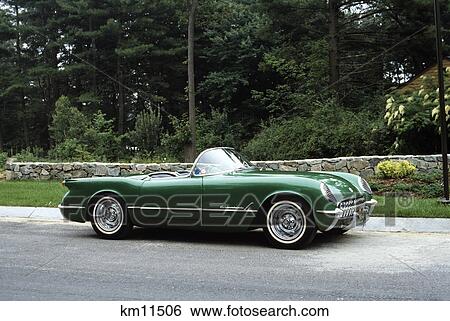 1950s 1954 vintage green corvette sport car with convertible top down outdoor stock photograph km11506 fotosearch https www fotosearch com clt005 km11506