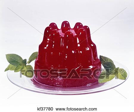 1950s 1960s 1970s plate of jell-o and mint leaves red vintage molded nostalgia View Large Photo Image Stock Image - 1950s 1960s 1970s plate of jell-o and mint leaves red vintage molded nostalgia. Fotosearch