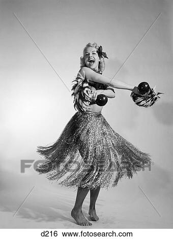 1950s 1960s barefoot laughing woman dancing wearing grass skirt View Large Photo Image Stock Photograph - 1950s 1960s barefoot laughing woman dancing wearing grass skirt. Fotosearch