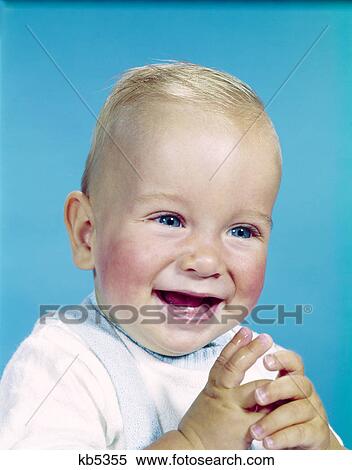 1950s 1960s happy laughing blond baby boy View Large Photo Image Stock Photography - 1950s 1960s happy laughing blond baby boy. Fotosearch