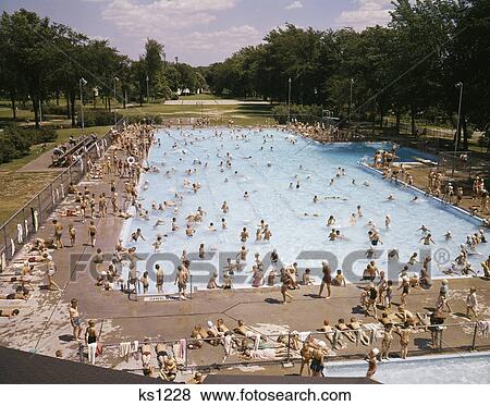 1950s 1960s public swimming pool kids children summer green bay wisconsin view from above View Large Photo Image Stock Photo - 1950s 1960s public swimming pool kids children summer green bay wisconsin view from above. Fotosearch