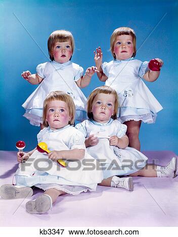 1950s 1960s quadruplet portrait 4 red haired girls wearing dresses two seated 2 standing View Large Photo Image Stock Photo - 1950s 1960s quadruplet portrait 4 red haired girls wearing dresses two seated 2 standing. Fotosearch
