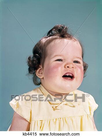 1950s 1960s smiling baby head shoulders open mouth showing two new teeth gums teething View Large Photo Image Stock Photography - 1950s 1960s smiling baby head shoulders open mouth showing two new teeth gums teething. Fotosearch