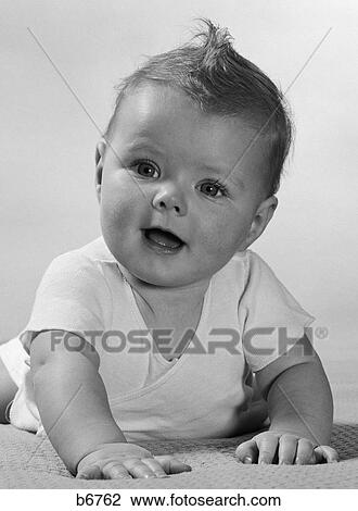 1950s baby crawl smile View Large Photo Image Stock Image - 1950s baby crawl smile. Fotosearch