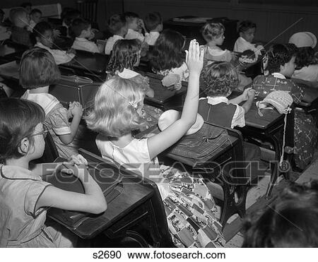 1950s elementary school students in classroom blonde girl raising hand View Large Photo Image Stock Image - 1950s elementary school students in classroom blonde girl raising hand. Fotosearch