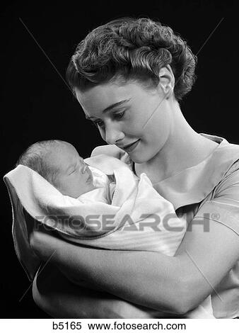 Stock Photography - 1950s mother and child. Fotosearch